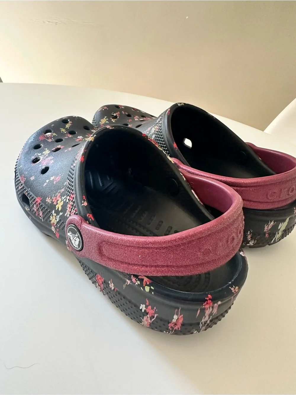 CROCS Kids Black Floral Clogs with Burgundy Heel Strap